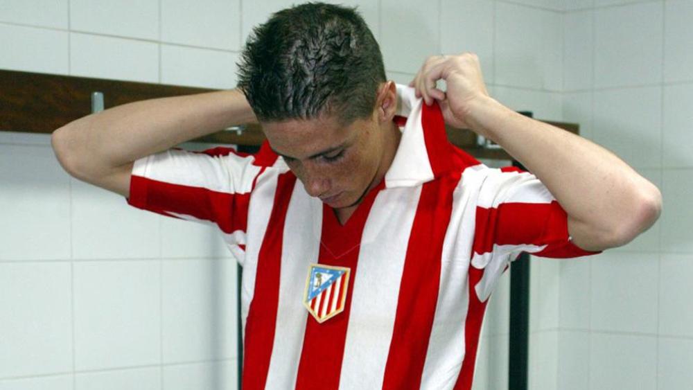 9 صور تُلخض مسيرة توريس الخالدة مع أتليتكو مدريد