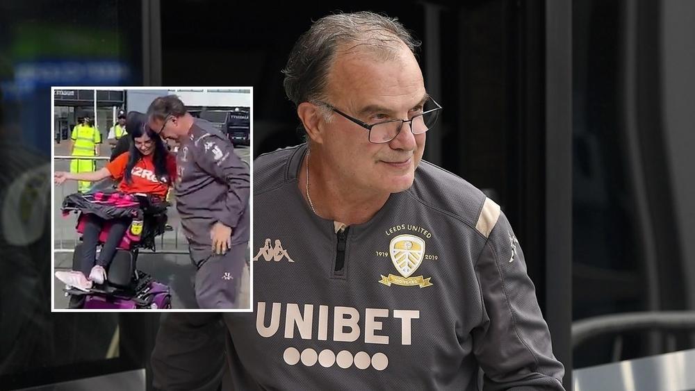 بييلسا يخطف الأنظار بـ"تواضعه".. مارسيلو يغادر سيارته لتحية مشجعة من ذوي الاحتياجات الخاصة