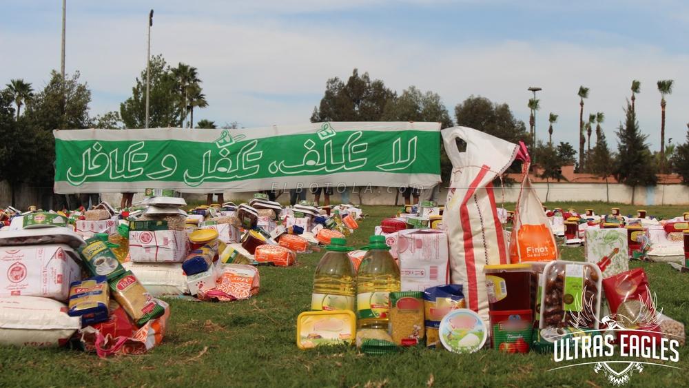 أولترا "إيغلز" توزع مجموعة مع "المساعدات الرمضانية" على الأسر المحتاجة