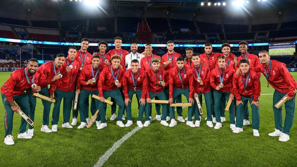 بعثة المنتخب المغربي تعود إلى أرض الوطن بعد تتويج تاريخي في الأولمبياد