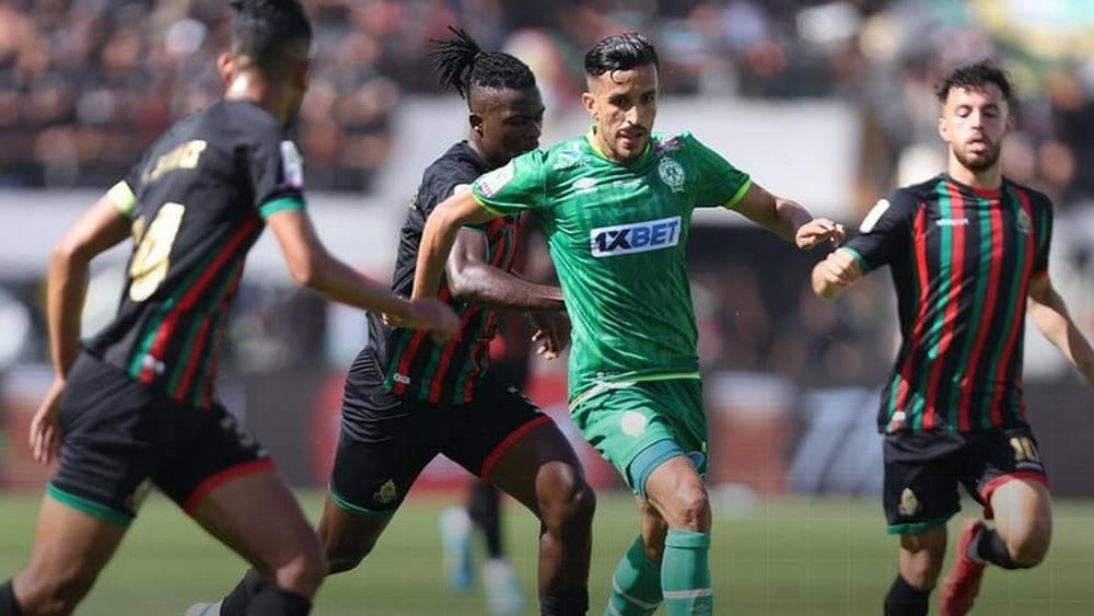 أبرزها مواجهة "الكلاسيكو" بين الرجاء والجيش الملكي.. الجولة الـ7 من البطولة الاحترافية تنطلق غدا الثلاثاء بلقاء ح. أكادير وا. تواركة وتختتم بمباراة ا. طنجة ون. الزمامرة